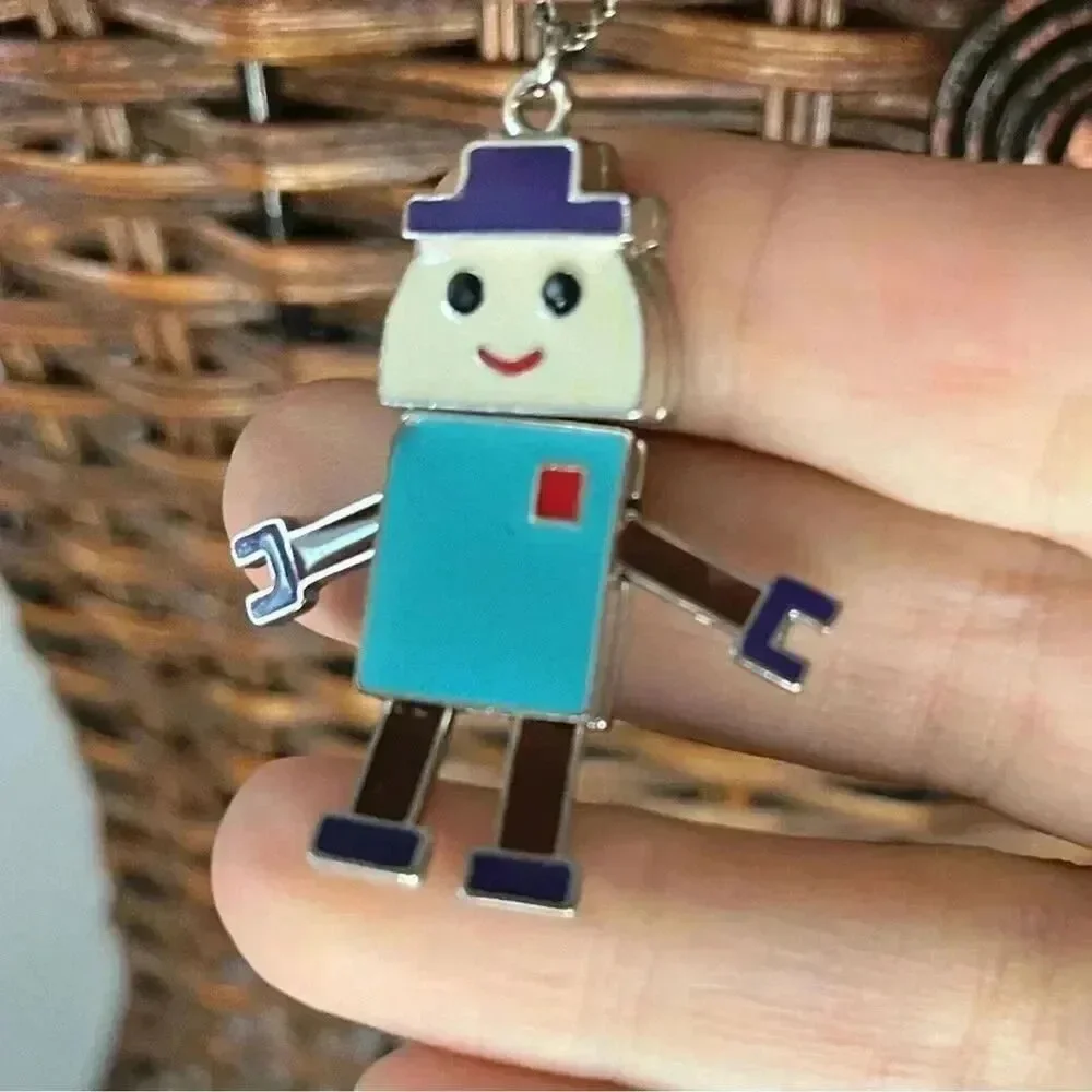 Articulating robot necklace on a silver tone chain